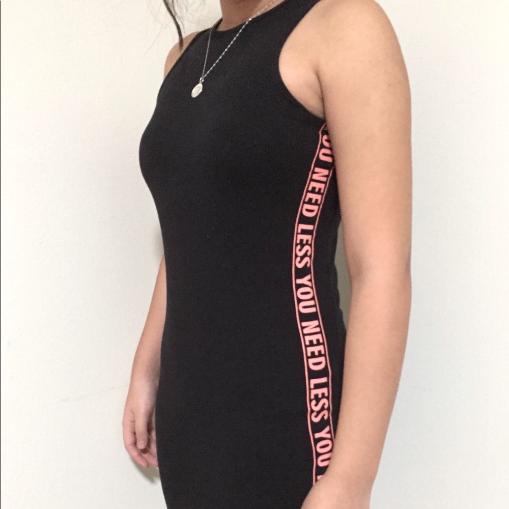 black dress “you need less” clockhouse